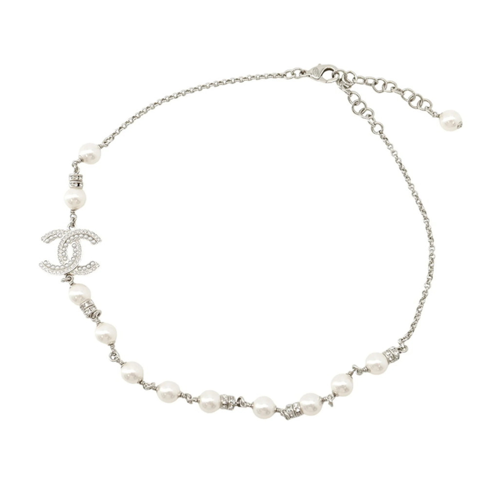 Chanel necklace with Coco Mark, faux pearl and rhinestone design. CHANEL for ...